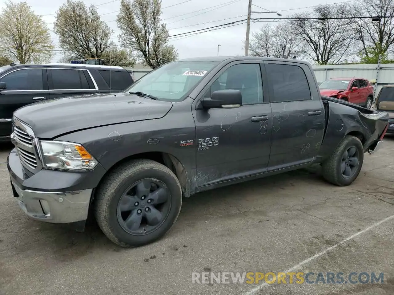 1 Photograph of a damaged car 1C6RR7LT3KS557821 RAM 1500 2019