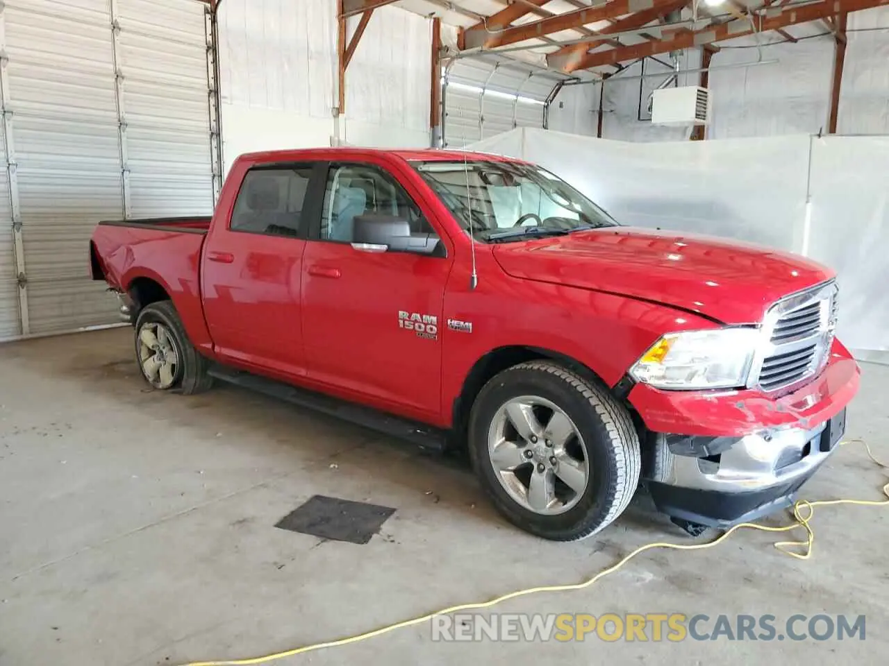 4 Photograph of a damaged car 1C6RR7LT5KS689818 RAM 1500 2019