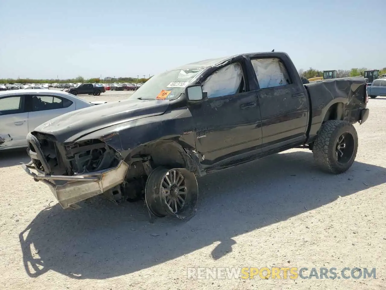 1 Photograph of a damaged car 1C6RR7LT6KS569767 RAM 1500 2019