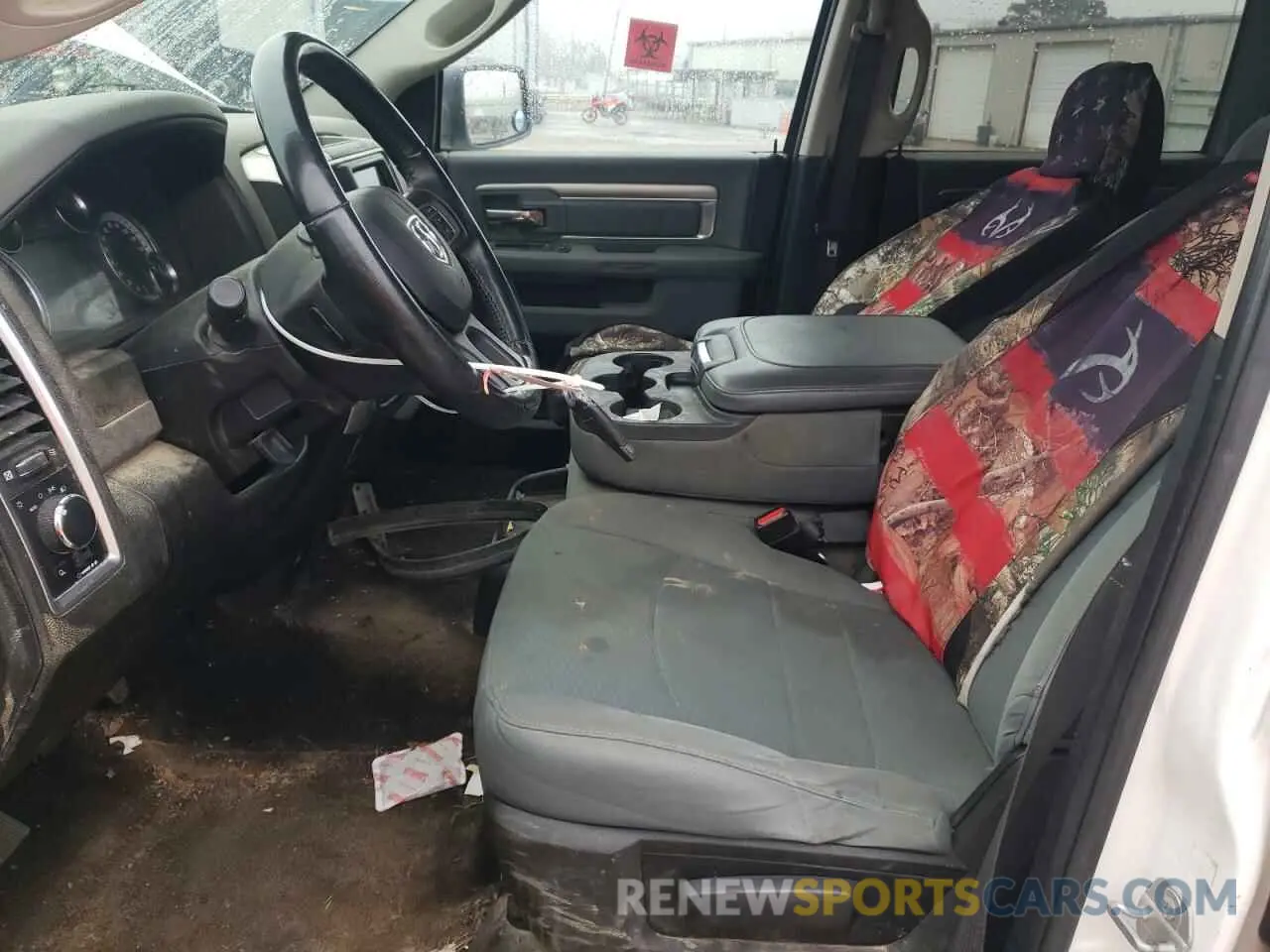 7 Photograph of a damaged car 1C6RR7LT9KS582304 RAM 1500 2019