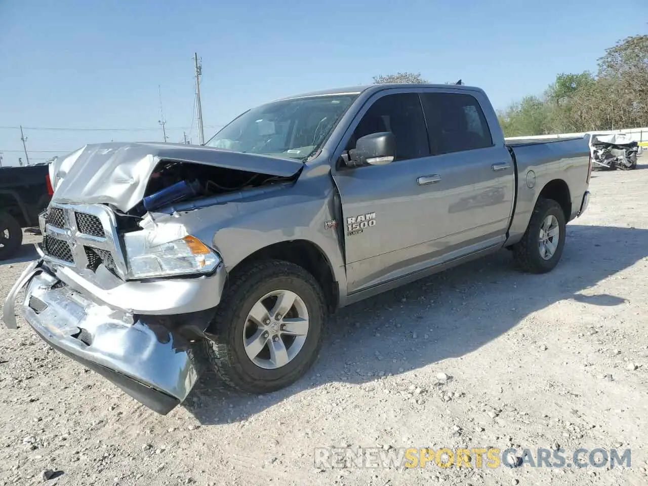 1 Photograph of a damaged car 1C6RR7LT9KS605807 RAM 1500 2019