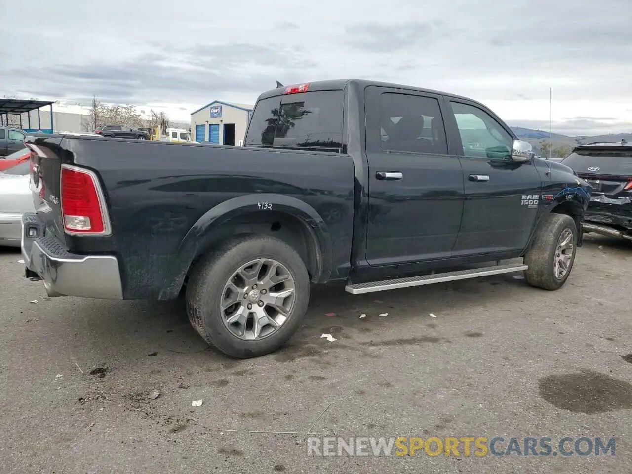 3 Photograph of a damaged car 1C6RR7NM6KS710214 RAM 1500 2019