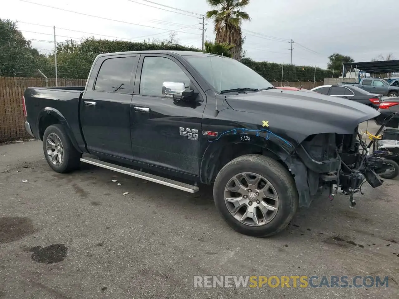 4 Photograph of a damaged car 1C6RR7NM6KS710214 RAM 1500 2019