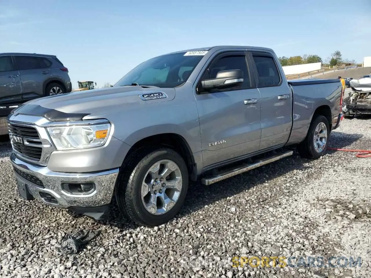 1 Photograph of a damaged car 1C6RREBTXKN884012 RAM 1500 2019