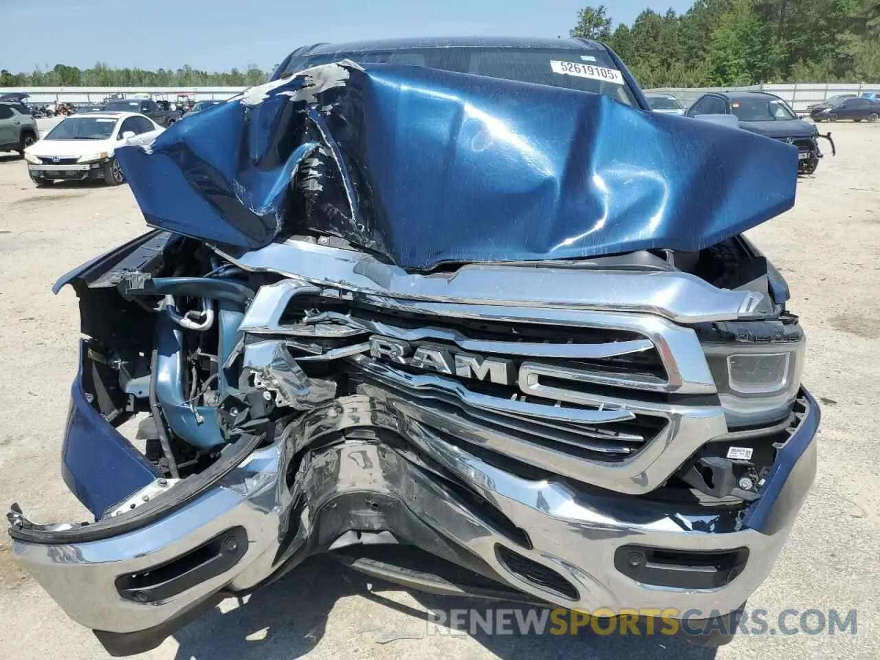 12 Photograph of a damaged car 1C6RREDT8KN769499 RAM 1500 2019
