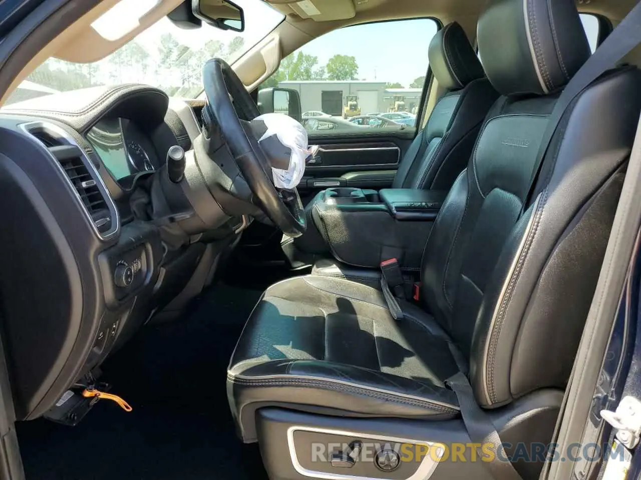 7 Photograph of a damaged car 1C6RREDT8KN769499 RAM 1500 2019