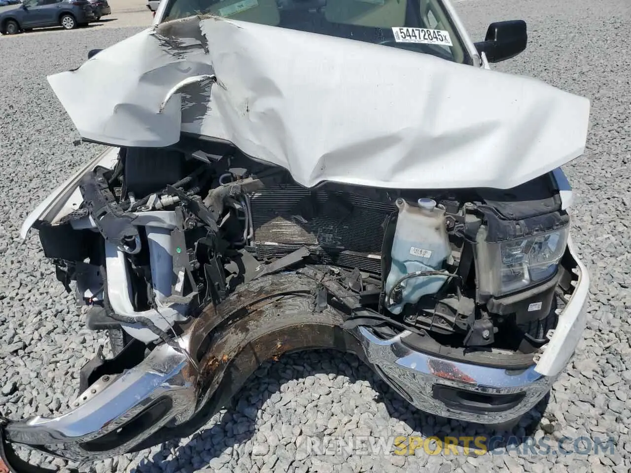 11 Photograph of a damaged car 1C6RREFG1KN793059 RAM 1500 2019