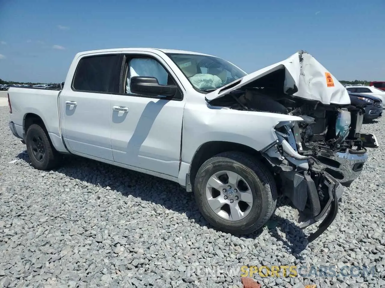 4 Photograph of a damaged car 1C6RREFG1KN793059 RAM 1500 2019