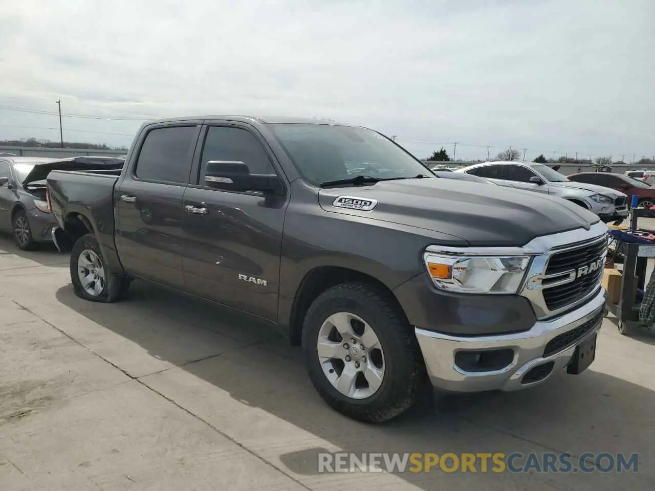4 Photograph of a damaged car 1C6RREFT0KN745503 RAM 1500 2019