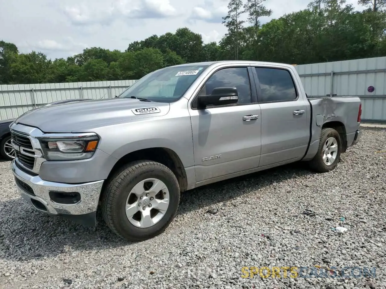 1 Photograph of a damaged car 1C6RREFT1KN508504 RAM 1500 2019
