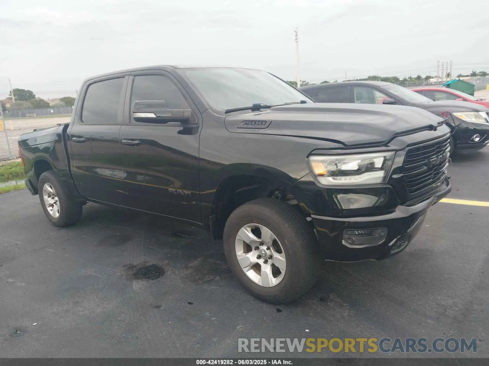 1 Photograph of a damaged car 1C6RREFT1KN888945 RAM 1500 2019