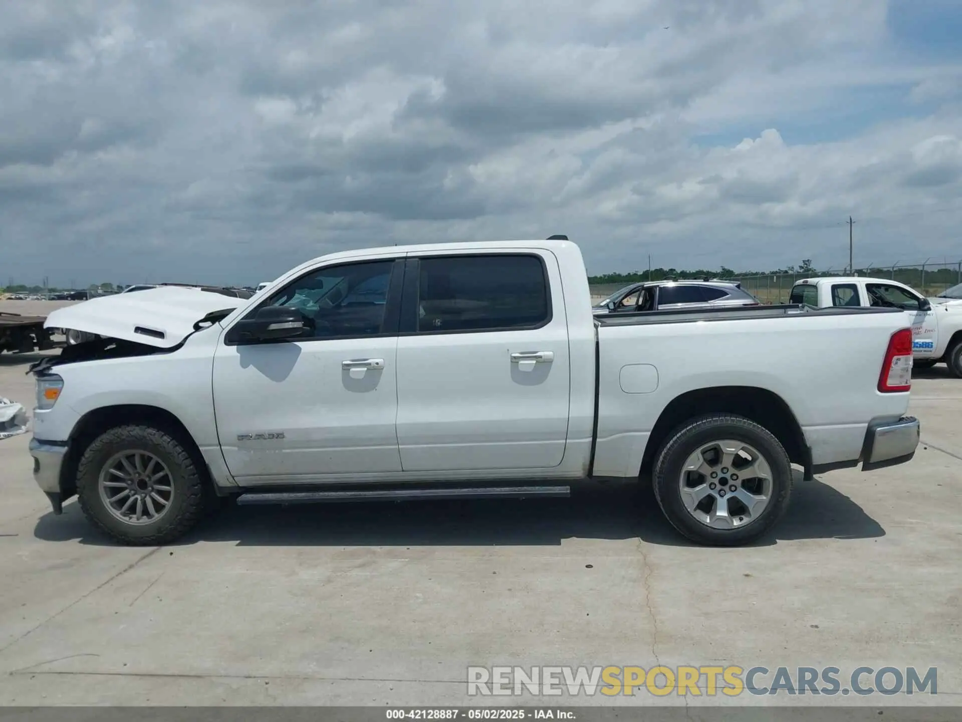 14 Photograph of a damaged car 1C6RREFT3KN581499 RAM 1500 2019