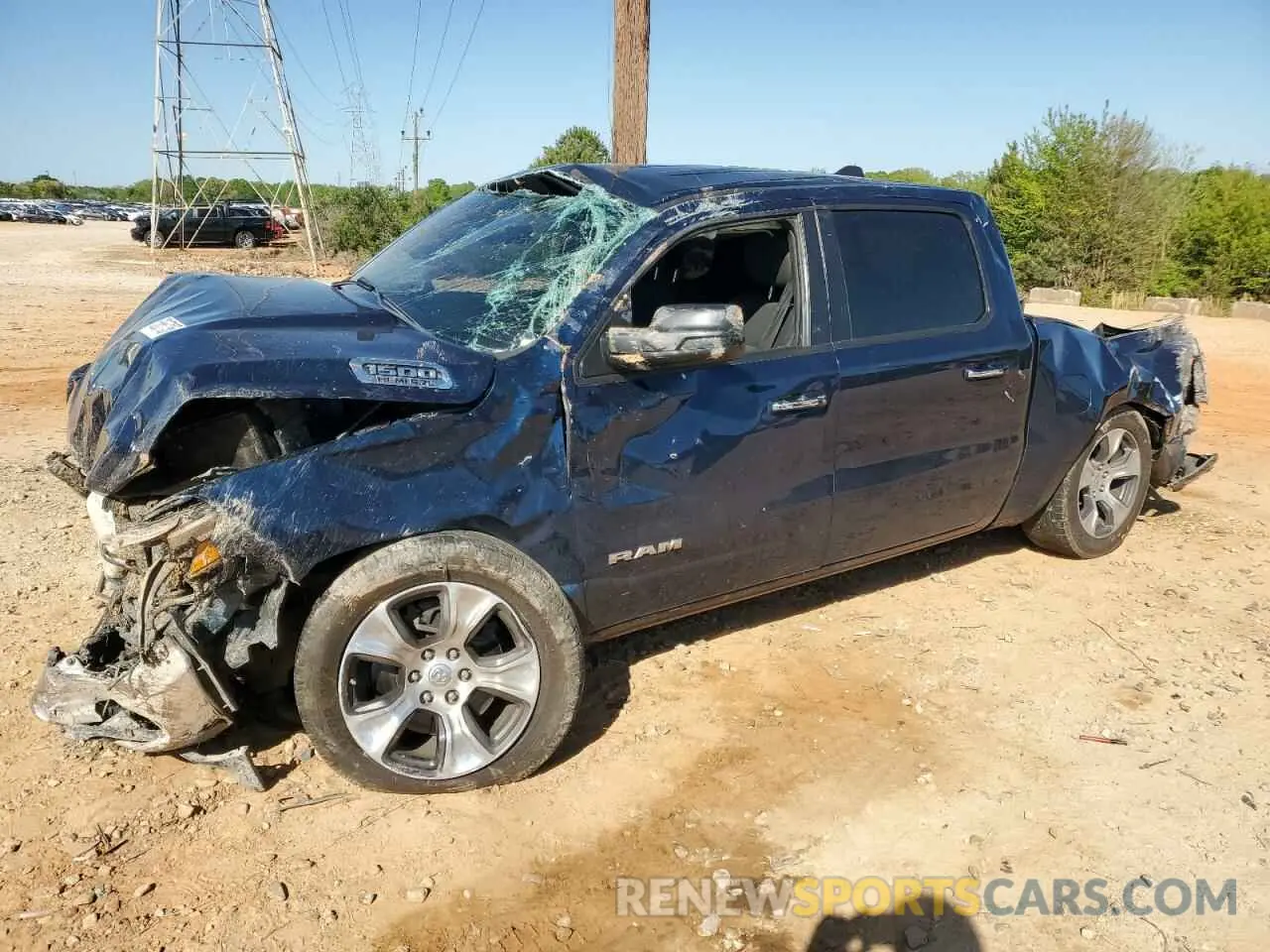 1 Photograph of a damaged car 1C6RREFT3KN828147 RAM 1500 2019