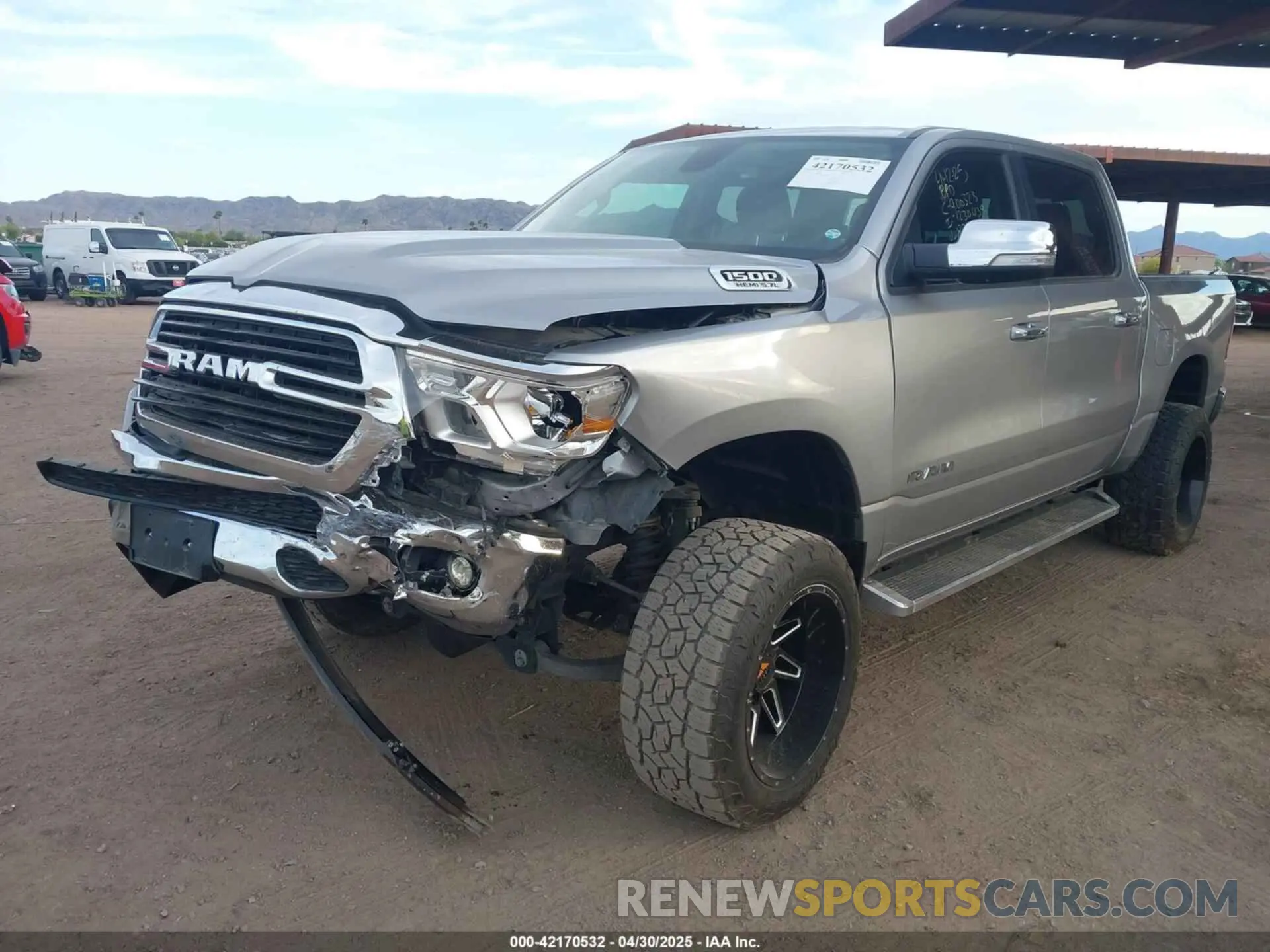 2 Photograph of a damaged car 1C6RREFT4KN828335 RAM 1500 2019