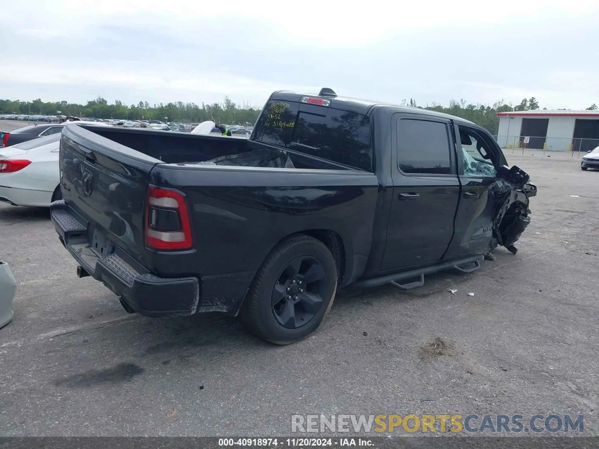 4 Photograph of a damaged car 1C6RREFT4KN852103 RAM 1500 2019