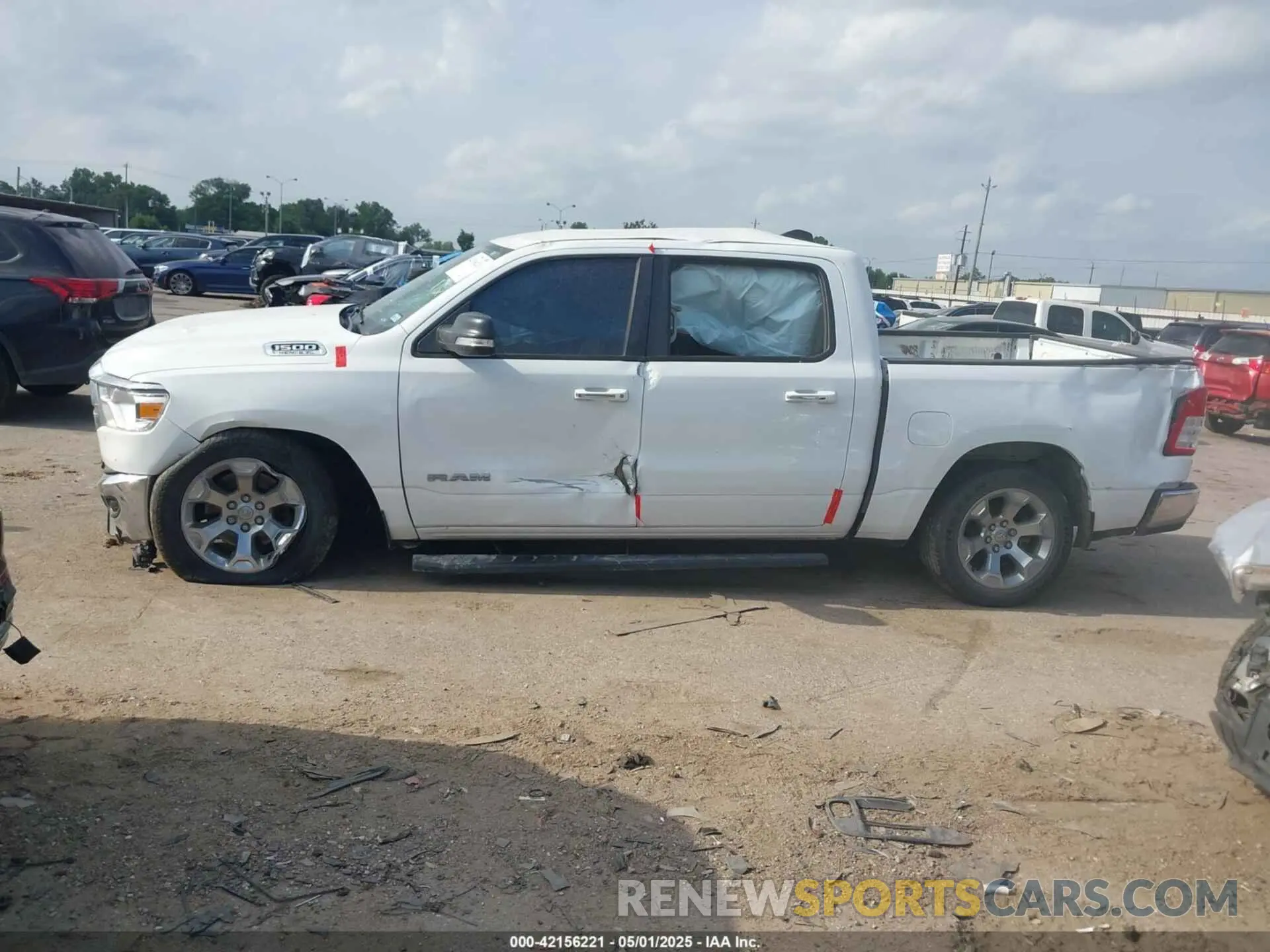 14 Photograph of a damaged car 1C6RREFT5KN596490 RAM 1500 2019