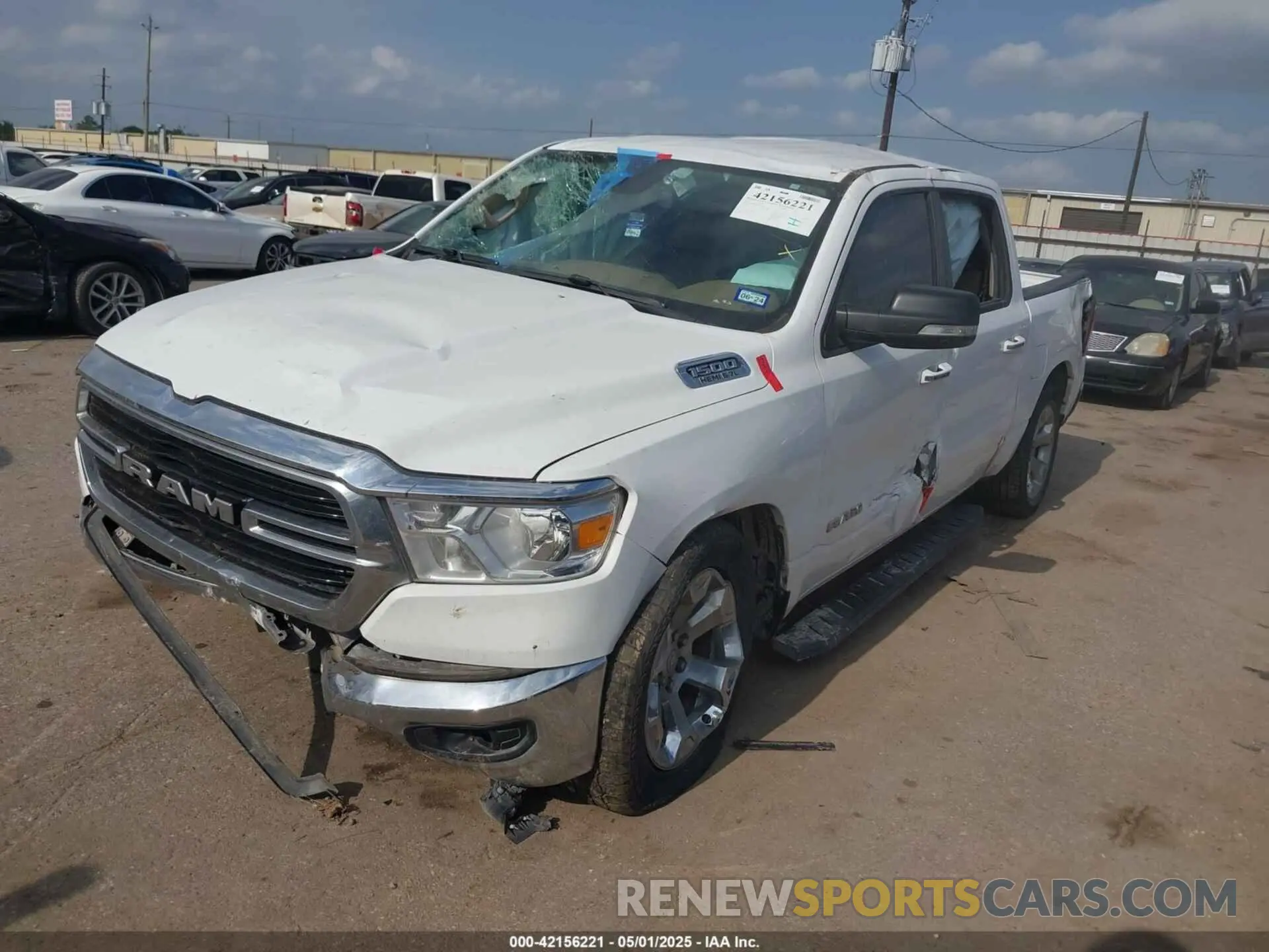 2 Photograph of a damaged car 1C6RREFT5KN596490 RAM 1500 2019