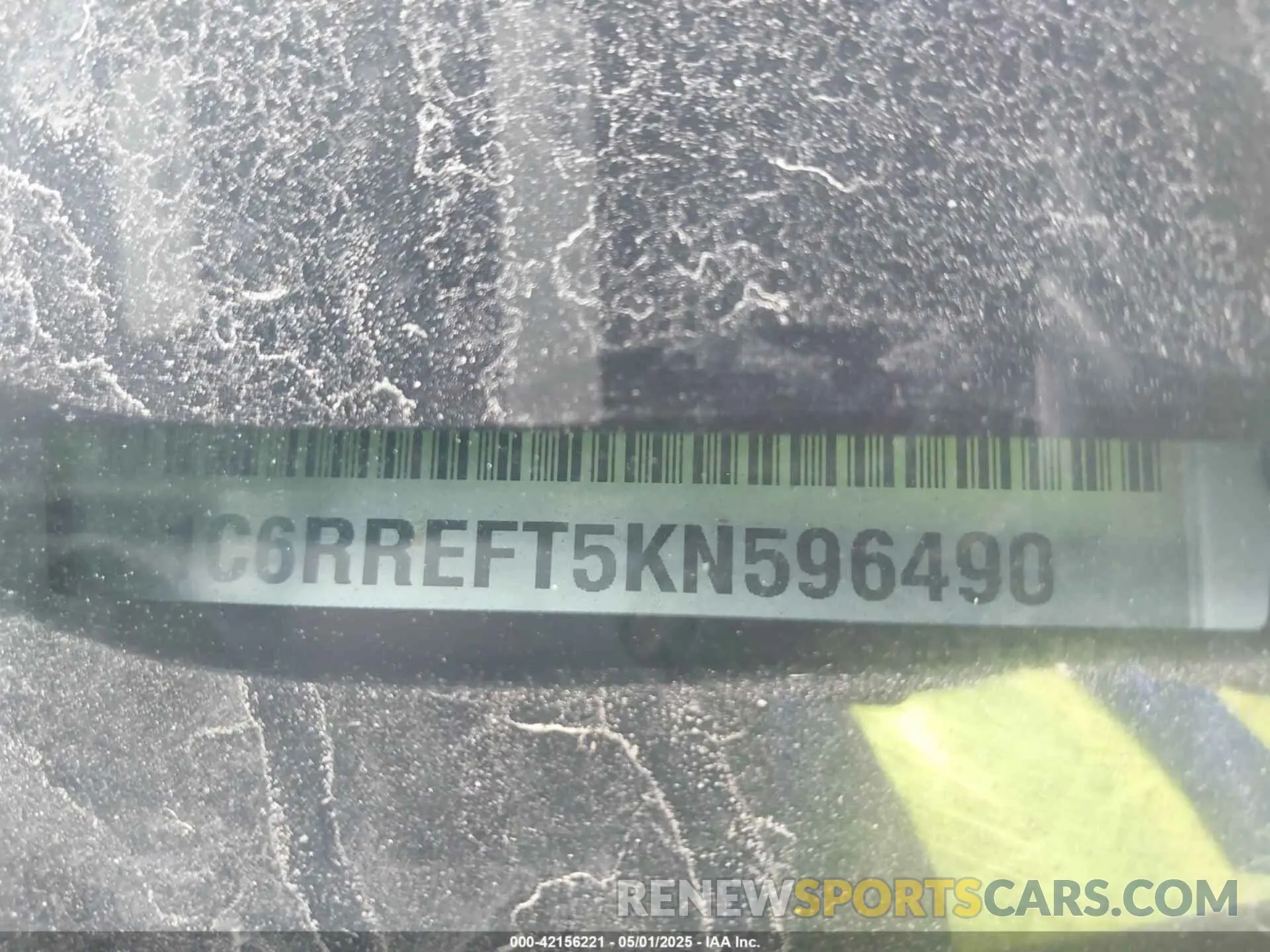 9 Photograph of a damaged car 1C6RREFT5KN596490 RAM 1500 2019
