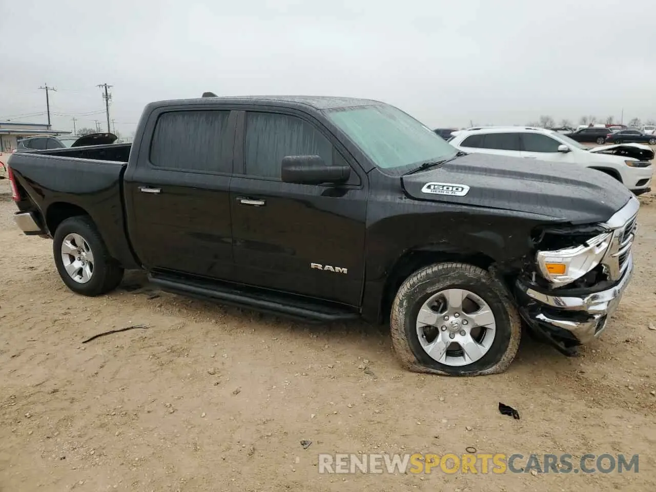 4 Photograph of a damaged car 1C6RREFT5KN786046 RAM 1500 2019