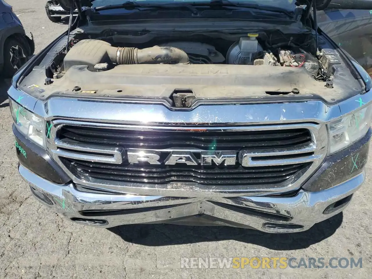 11 Photograph of a damaged car 1C6RREFT7KN650890 RAM 1500 2019