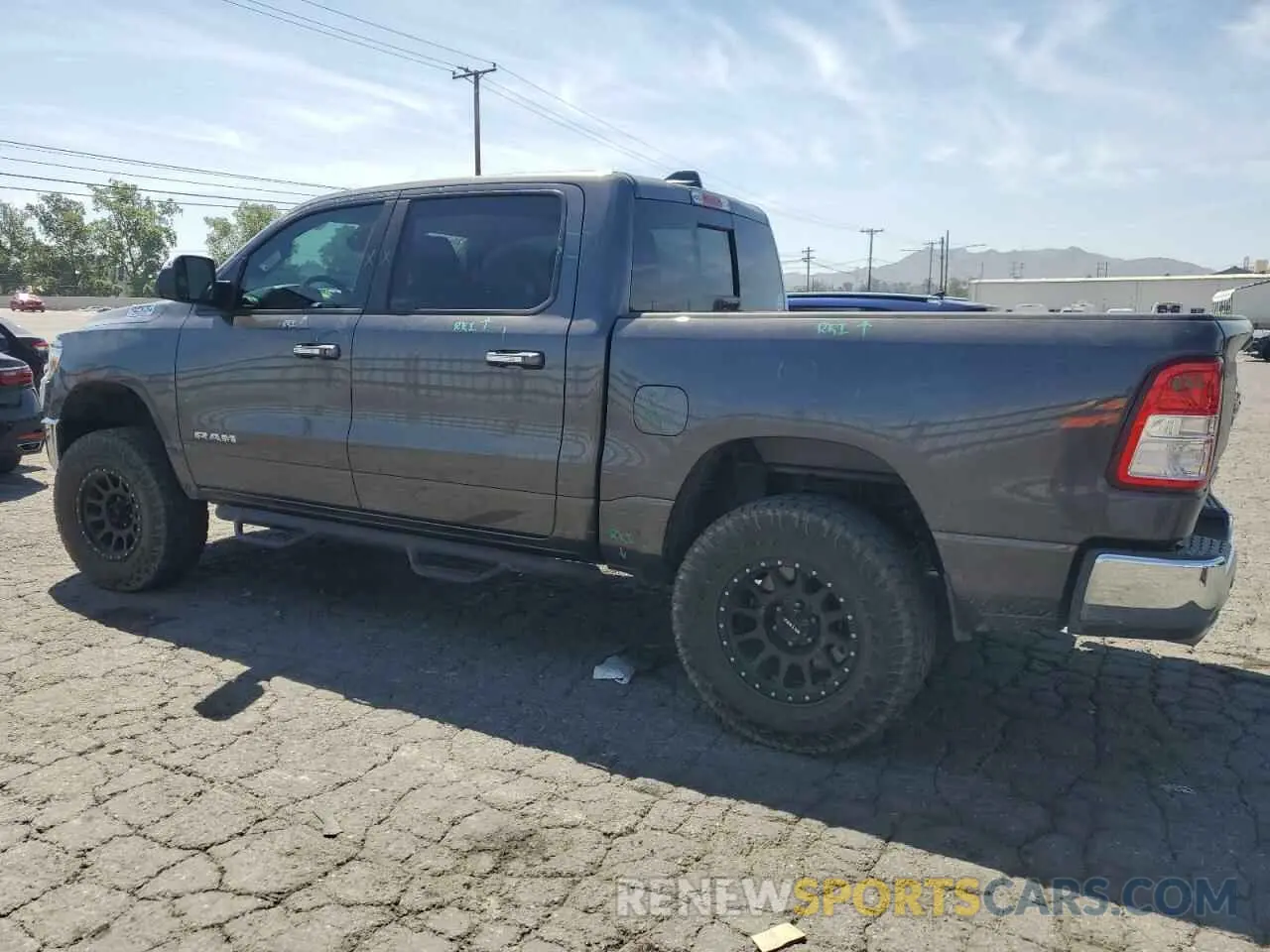 2 Photograph of a damaged car 1C6RREFT7KN650890 RAM 1500 2019