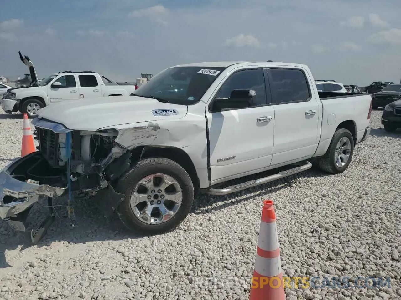 1 Photograph of a damaged car 1C6RREFT8KN527101 RAM 1500 2019