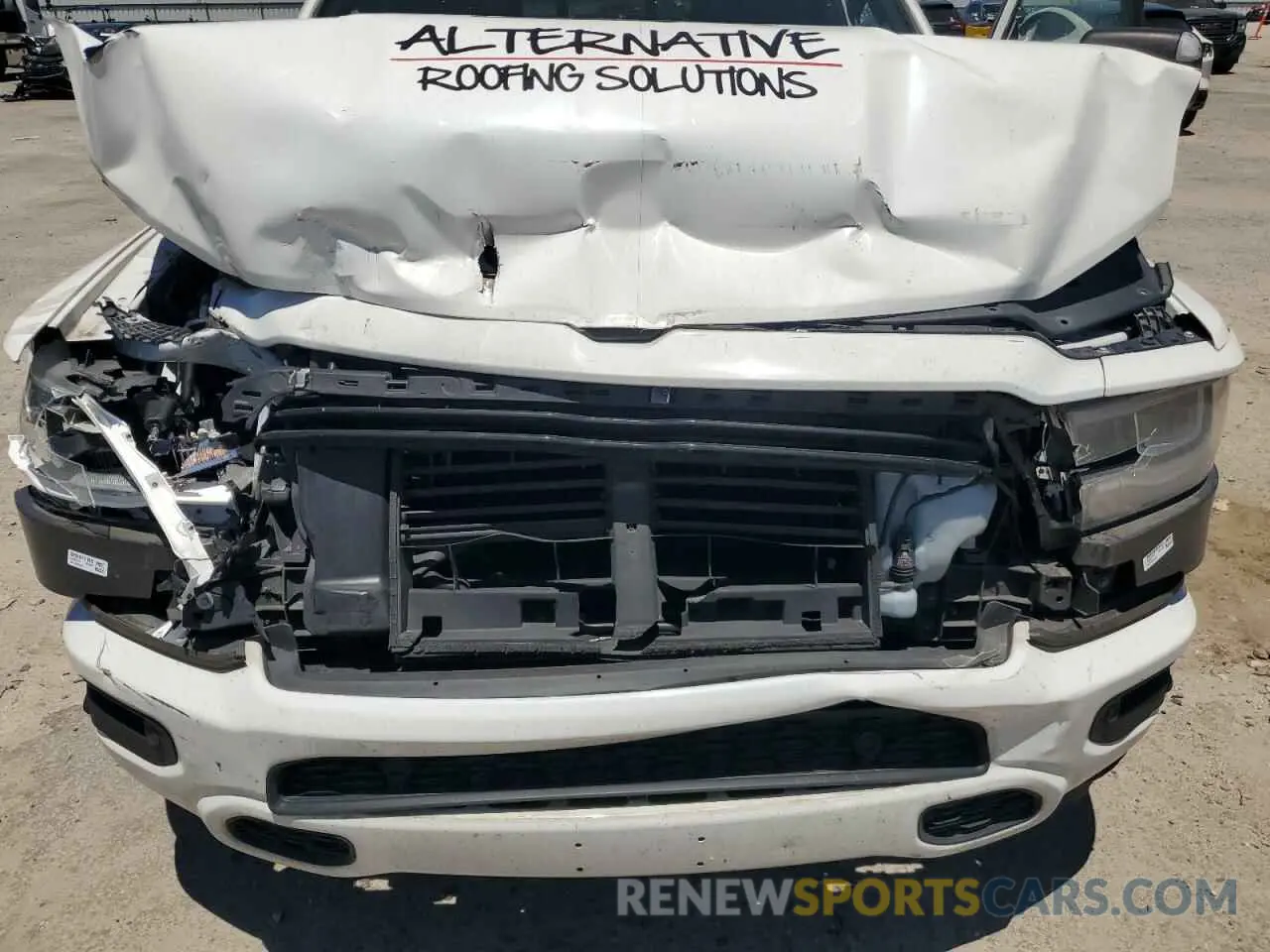 11 Photograph of a damaged car 1C6RREFT9KN558180 RAM 1500 2019