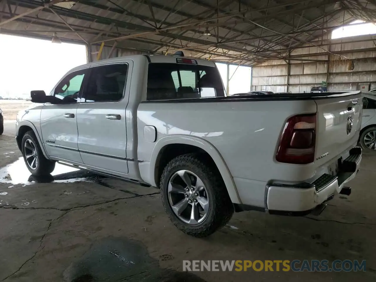 2 Photograph of a damaged car 1C6RREHT4KN771003 RAM 1500 2019