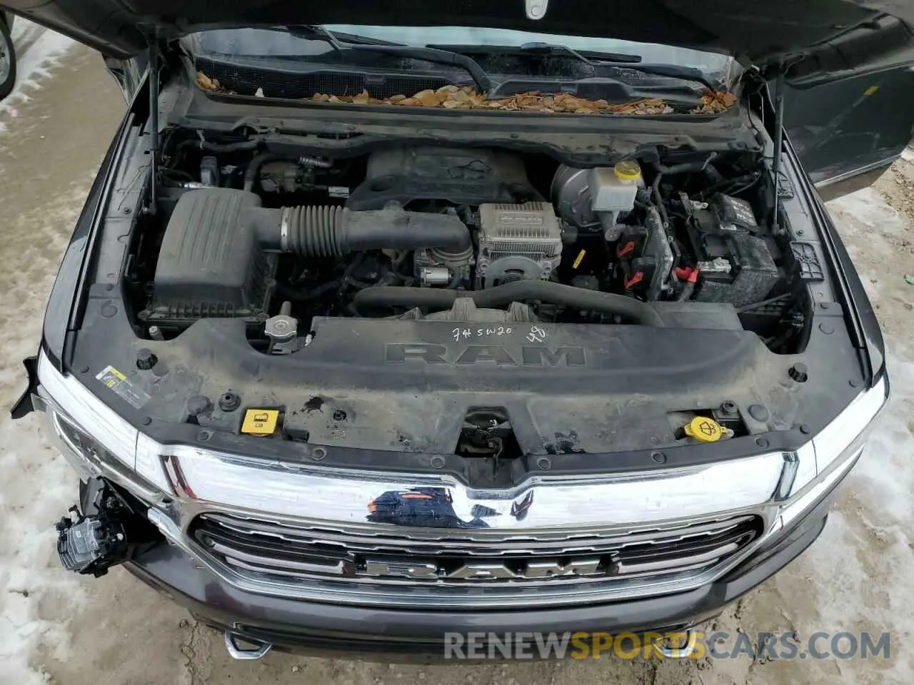 11 Photograph of a damaged car 1C6RREHT6KN827457 RAM 1500 2019