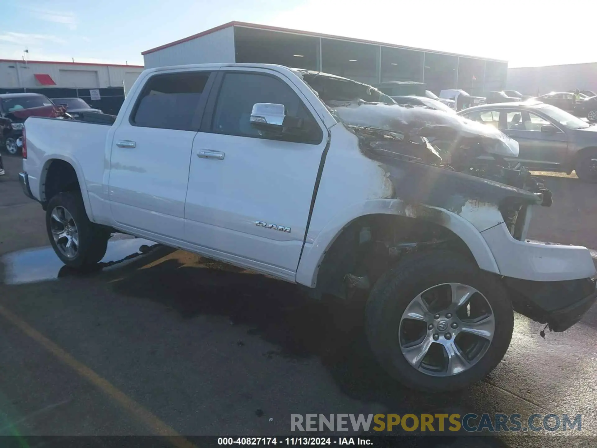 1 Photograph of a damaged car 1C6RREJT3KN912721 RAM 1500 2019