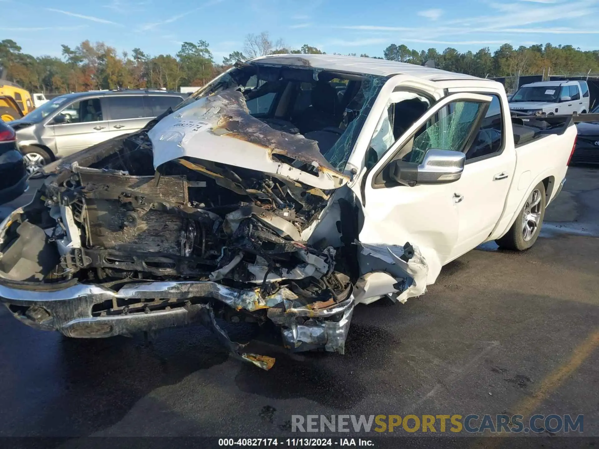 2 Photograph of a damaged car 1C6RREJT3KN912721 RAM 1500 2019