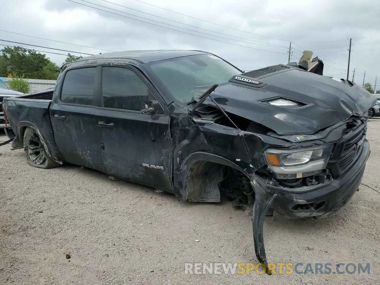 4 Photograph of a damaged car 1C6RREJT7KN894157 RAM 1500 2019