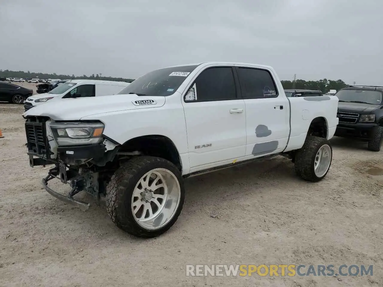 1 Photograph of a damaged car 1C6RREMT6KN683530 RAM 1500 2019