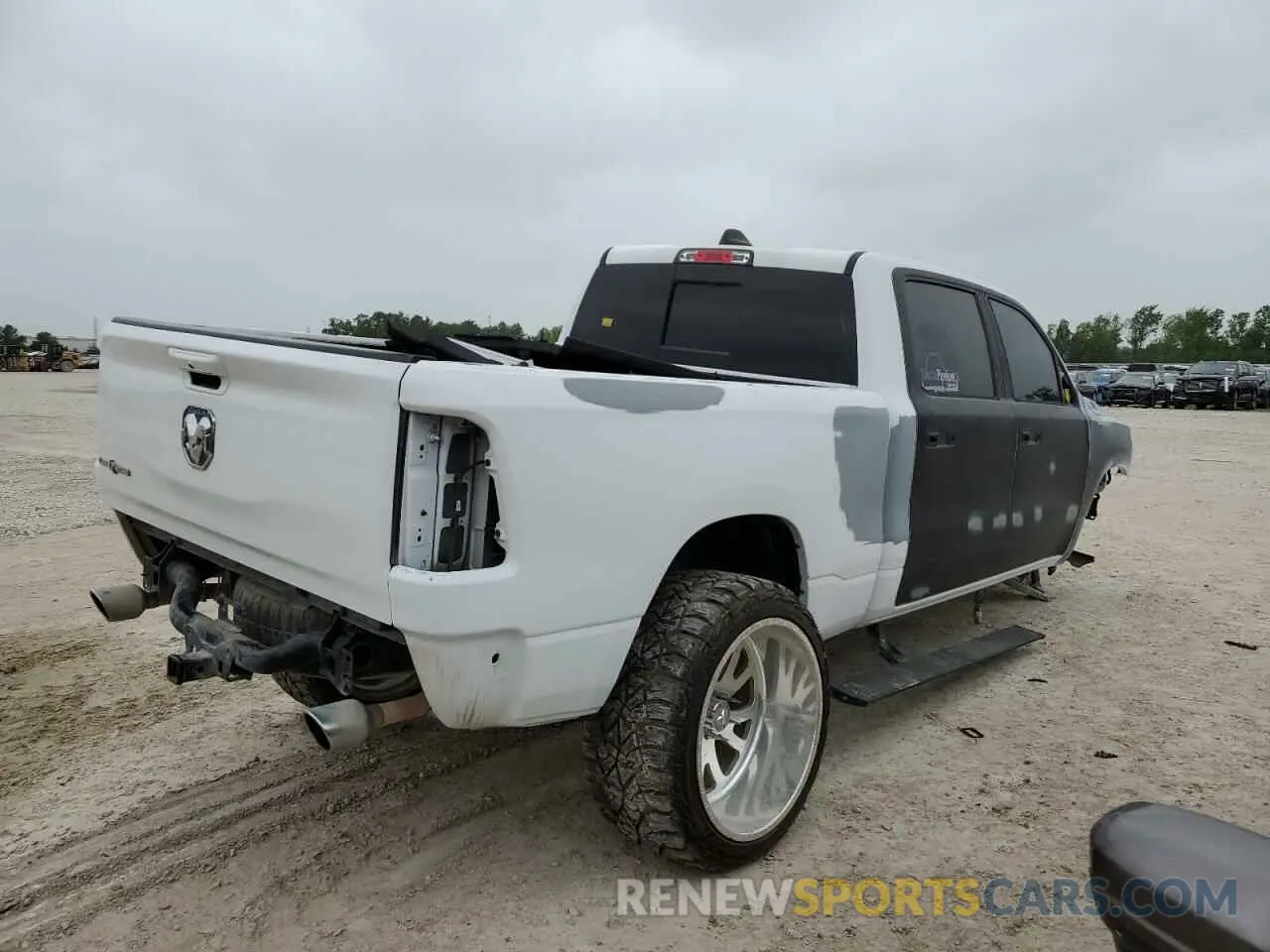 3 Photograph of a damaged car 1C6RREMT6KN683530 RAM 1500 2019