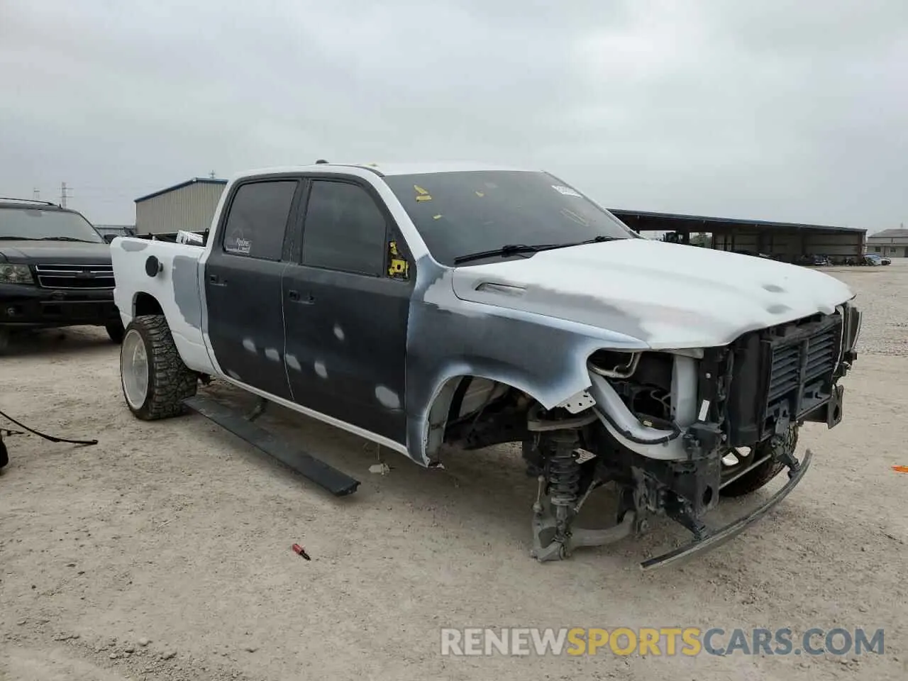 4 Photograph of a damaged car 1C6RREMT6KN683530 RAM 1500 2019