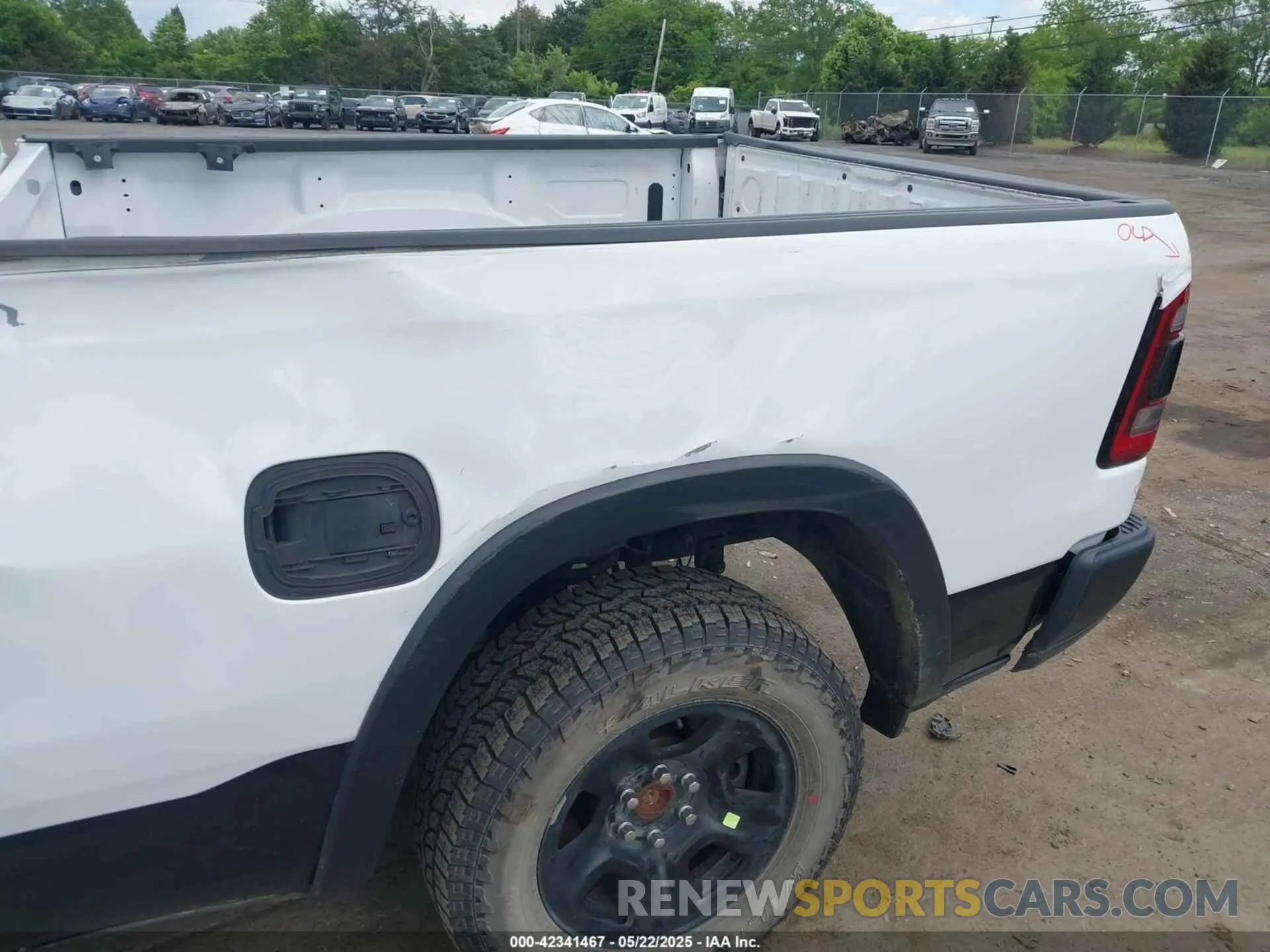 19 Photograph of a damaged car 1C6RRFEG0KN806763 RAM 1500 2019