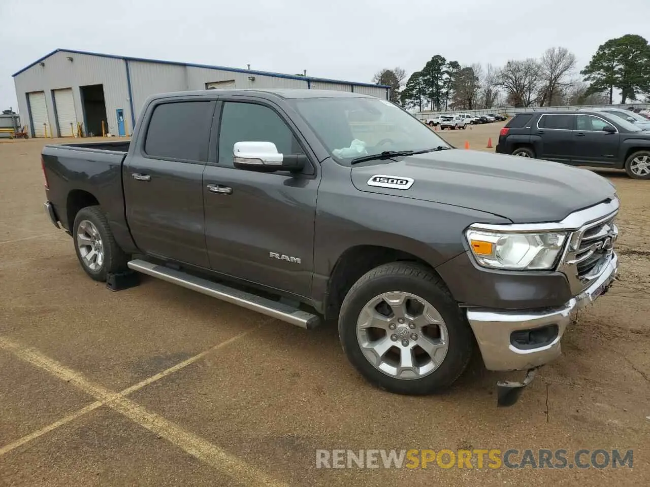 4 Photograph of a damaged car 1C6RRFFG0KN714292 RAM 1500 2019