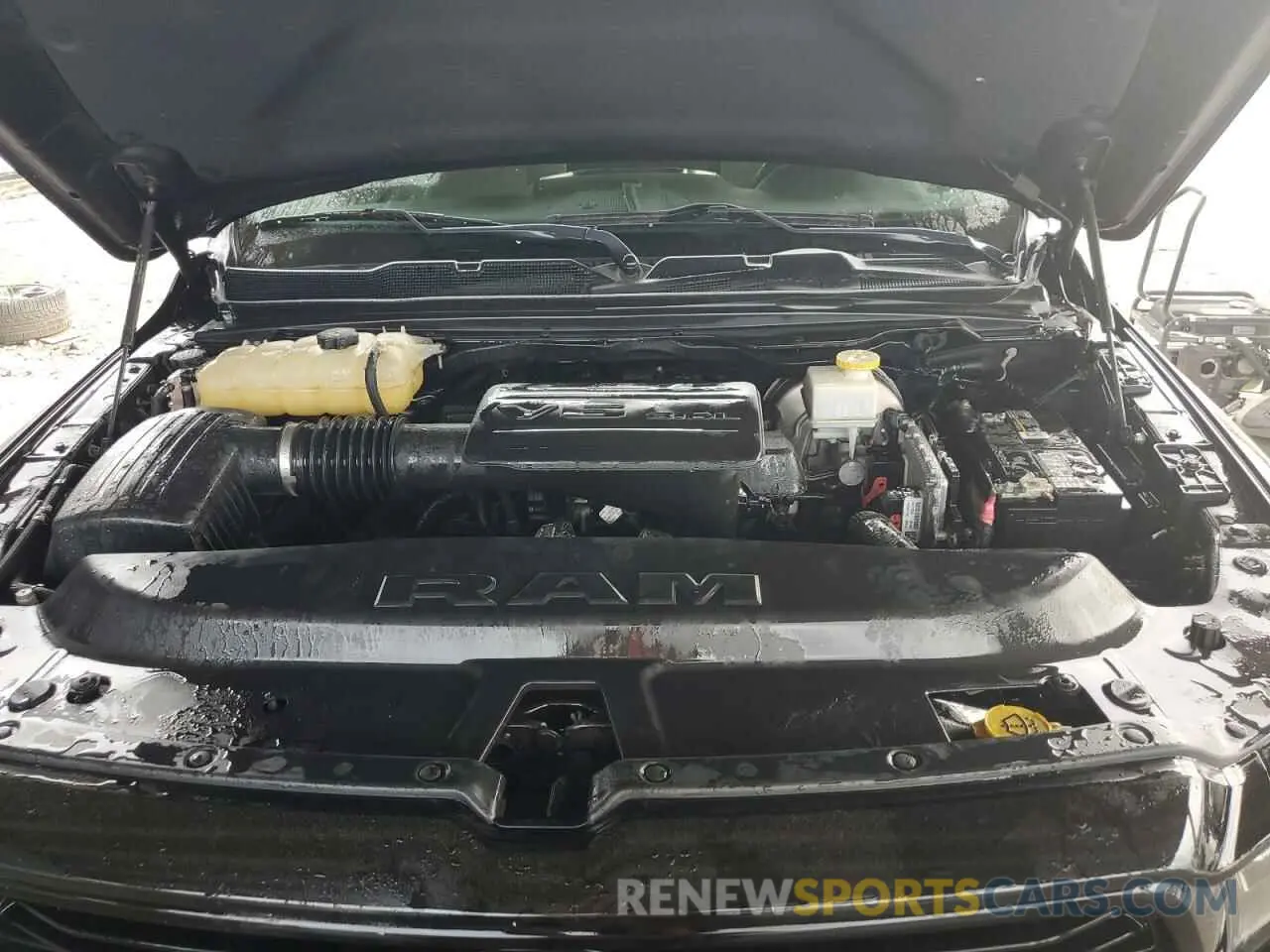 11 Photograph of a damaged car 1C6RRFFG0KN737636 RAM 1500 2019