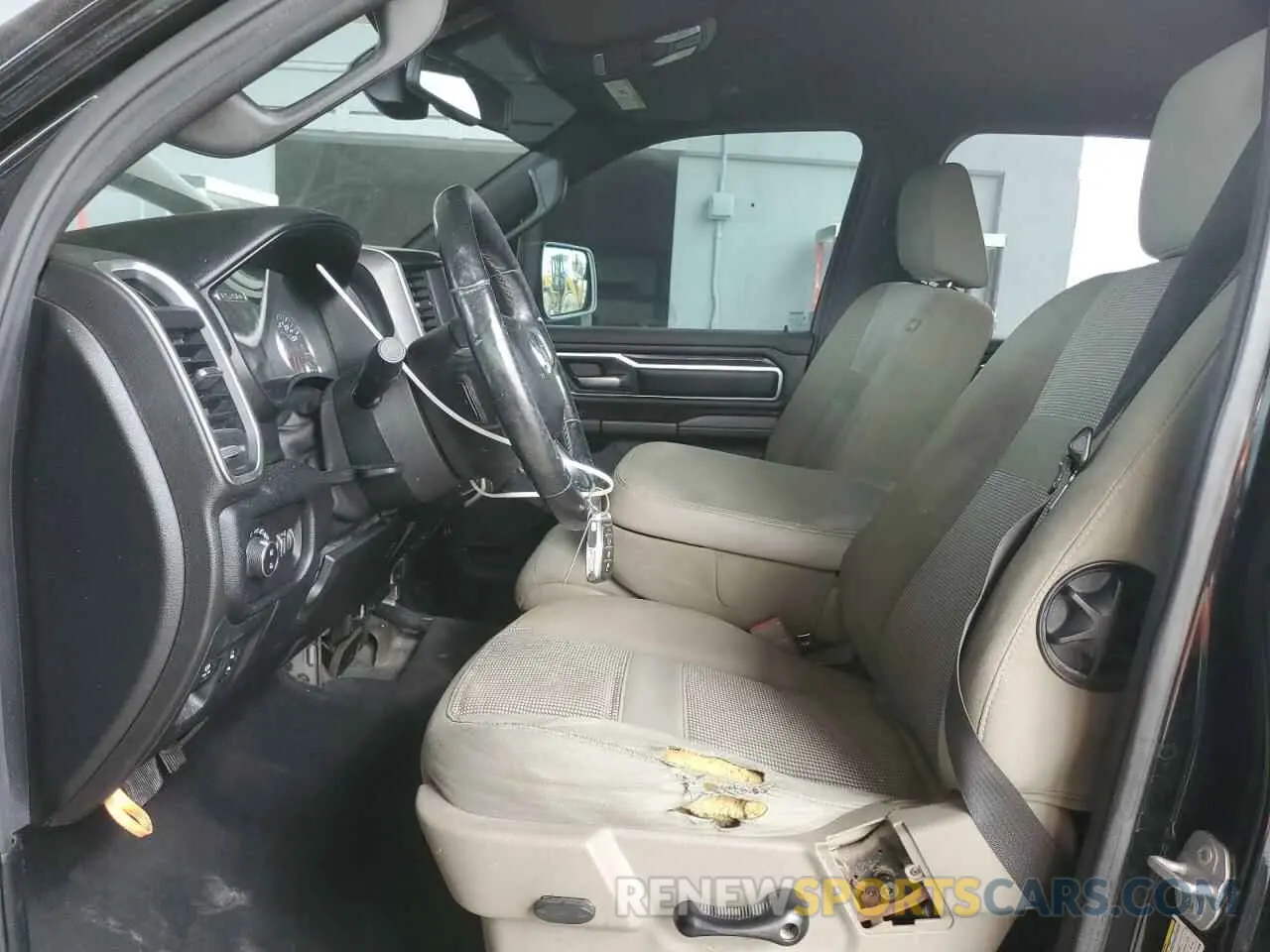 7 Photograph of a damaged car 1C6RRFFG0KN737636 RAM 1500 2019