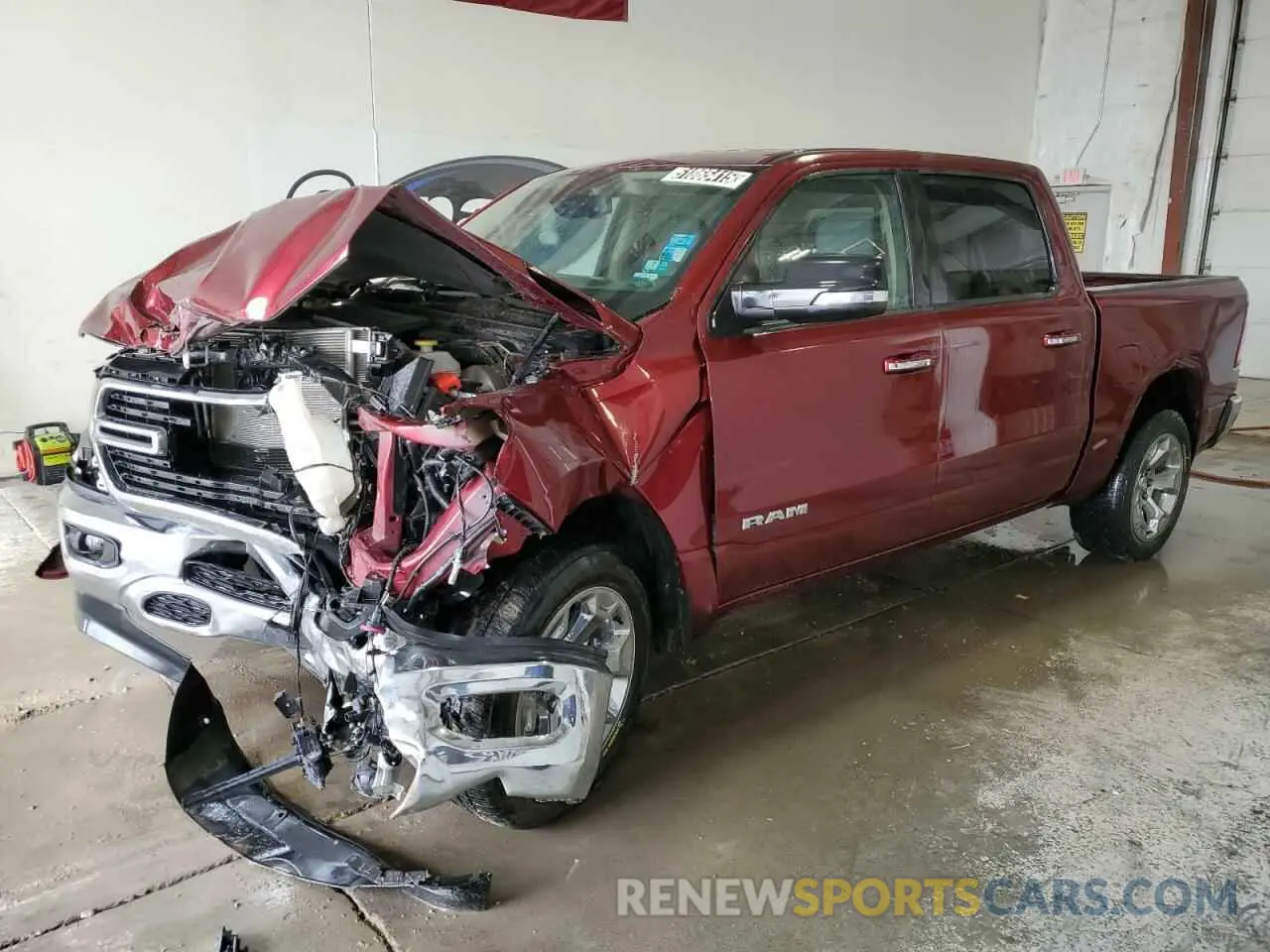 1 Photograph of a damaged car 1C6RRFFG1KN675874 RAM 1500 2019