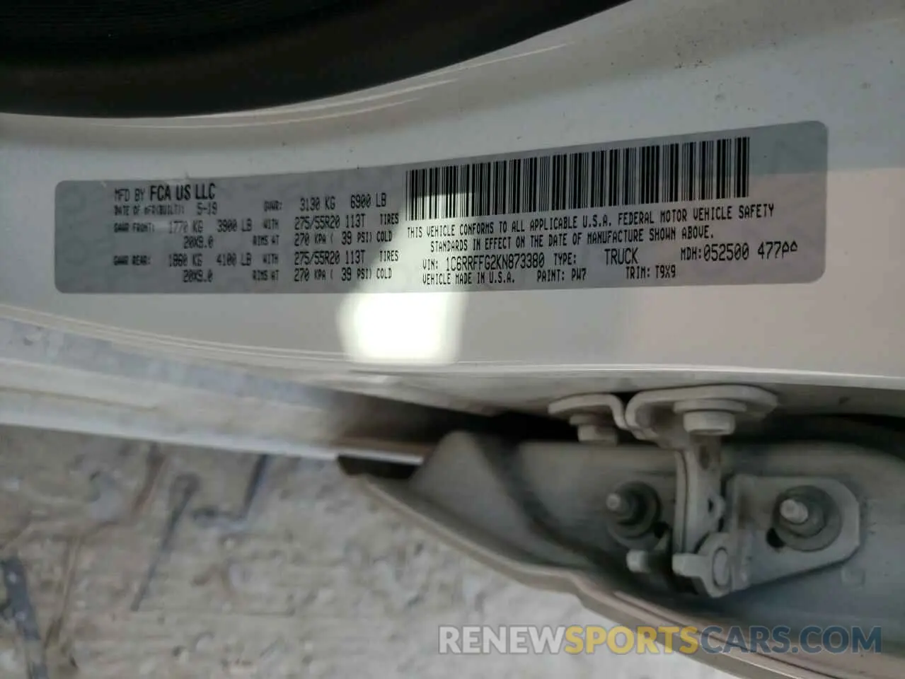 12 Photograph of a damaged car 1C6RRFFG2KN873380 RAM 1500 2019