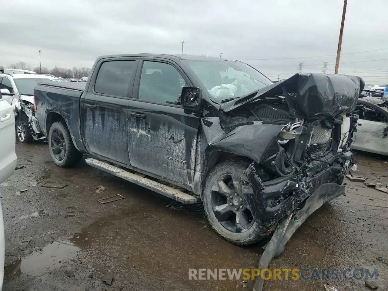 4 Photograph of a damaged car 1C6RRFFG2KN881477 RAM 1500 2019