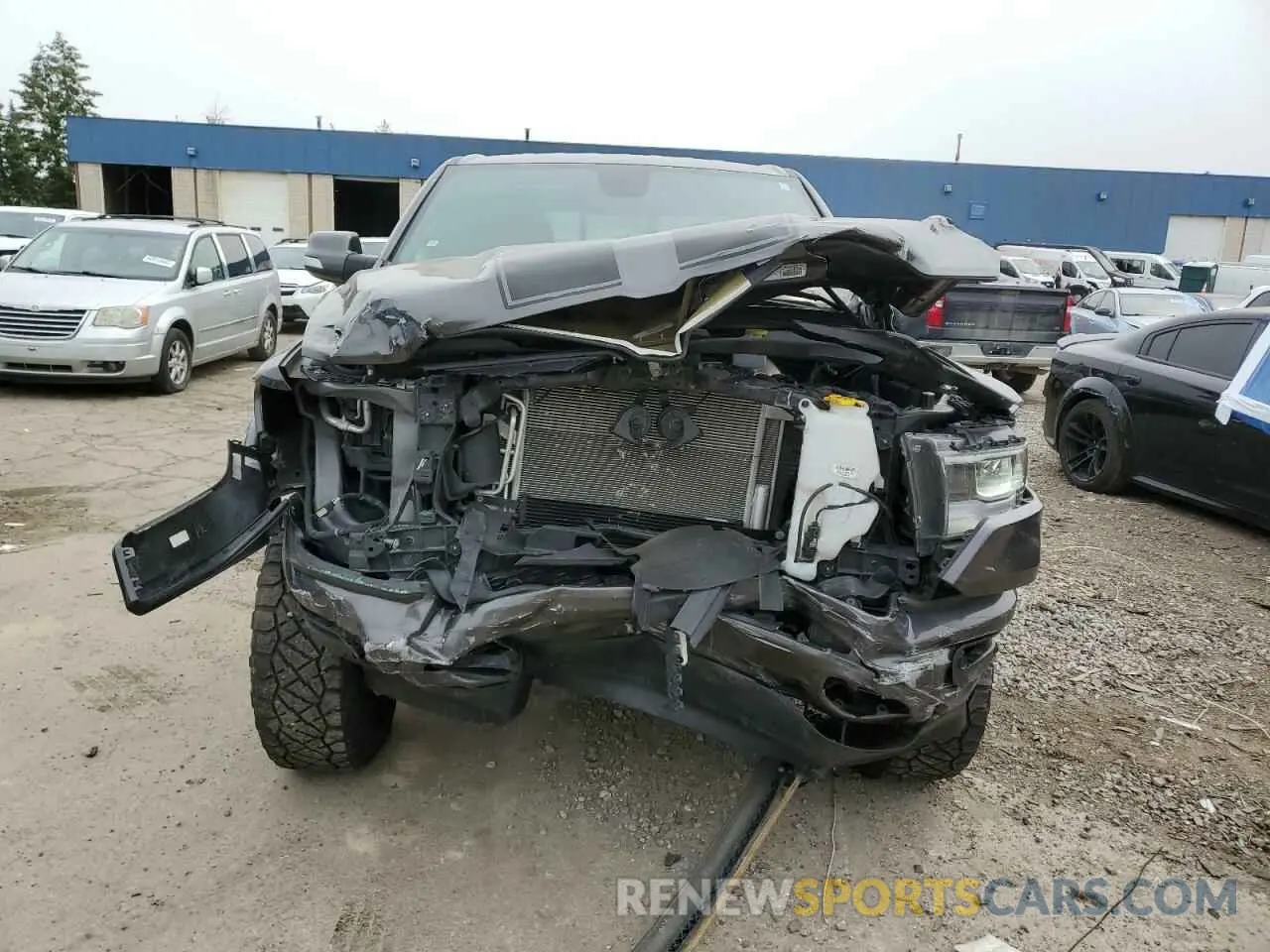 5 Photograph of a damaged car 1C6RRFFG6KN803591 RAM 1500 2019