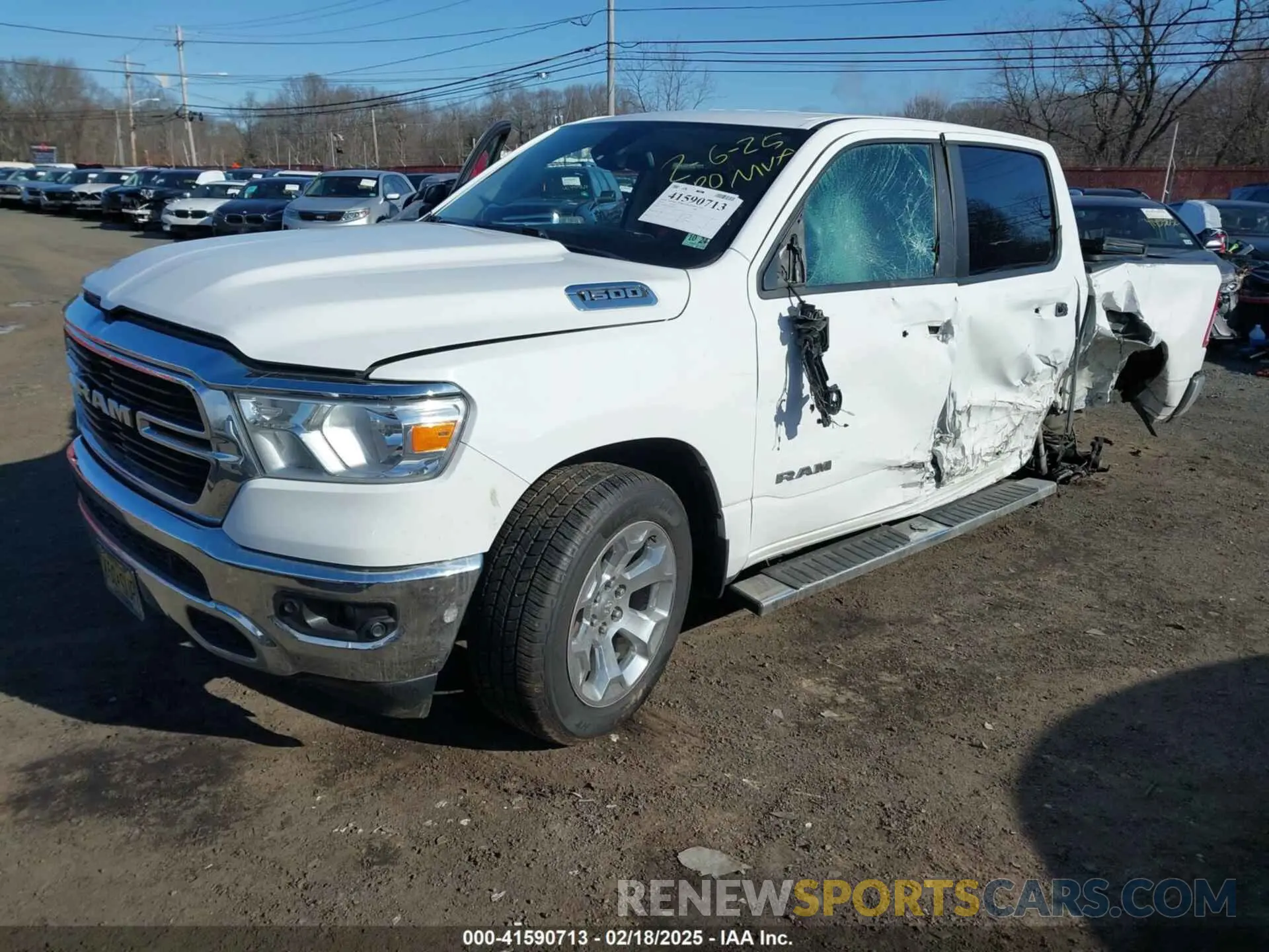 2 Photograph of a damaged car 1C6RRFFG7KN646220 RAM 1500 2019
