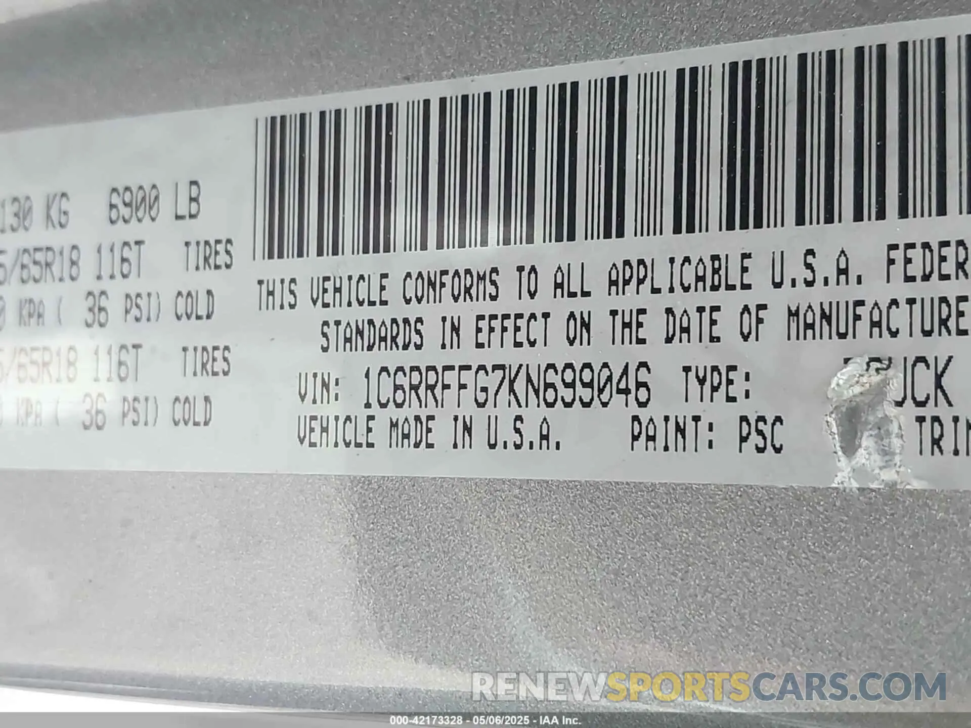 9 Photograph of a damaged car 1C6RRFFG7KN699046 RAM 1500 2019