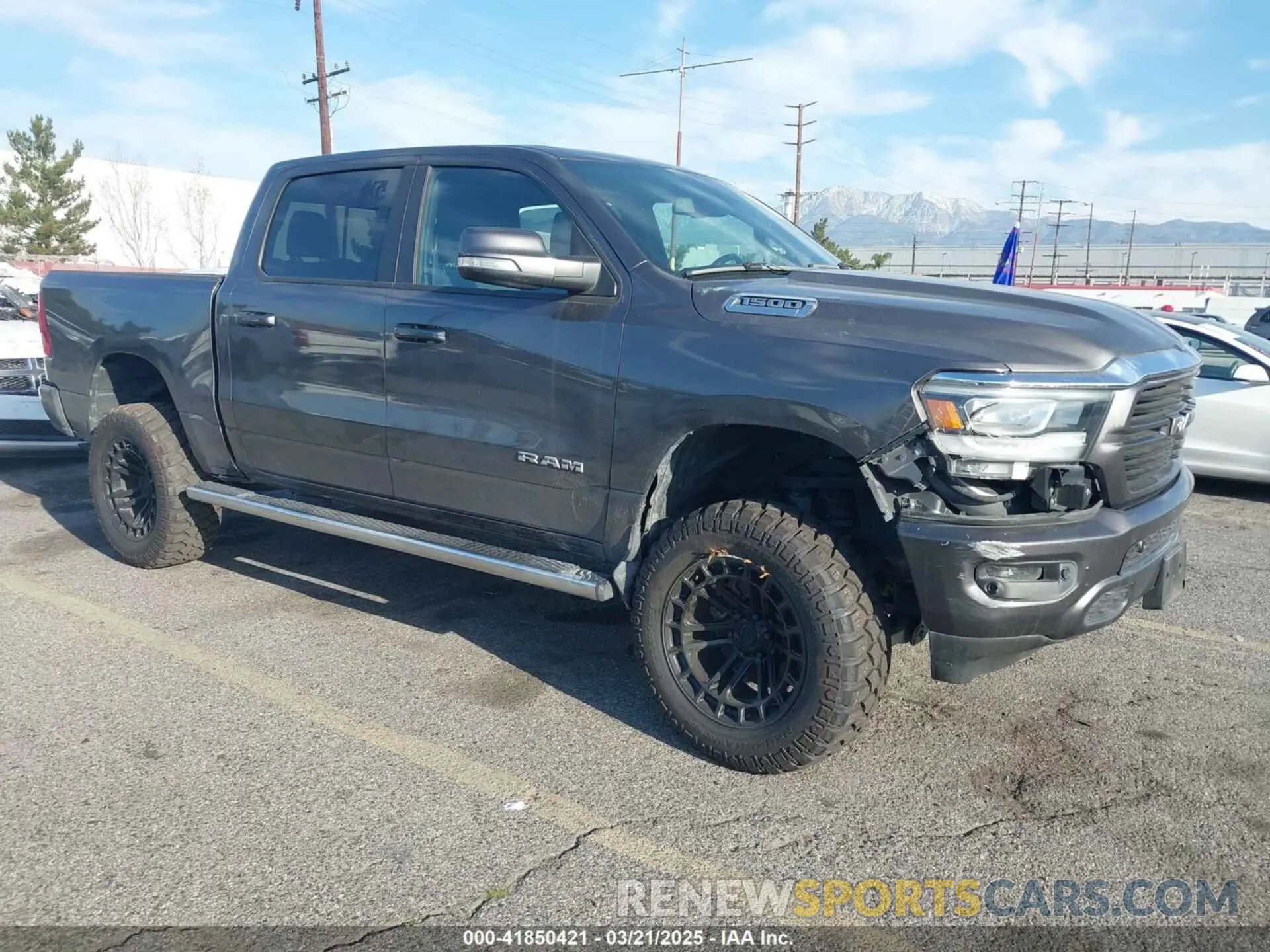 1 Photograph of a damaged car 1C6RRFFG8KN710927 RAM 1500 2019