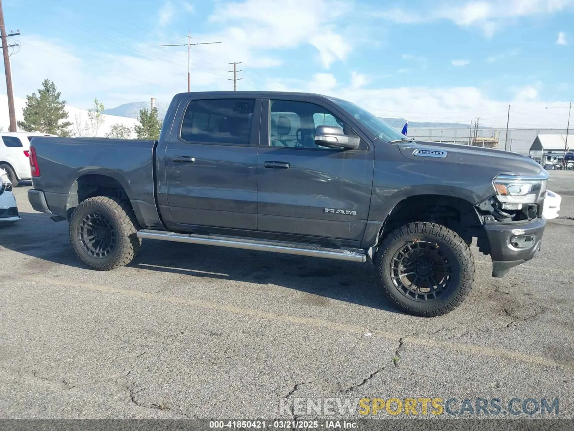 13 Photograph of a damaged car 1C6RRFFG8KN710927 RAM 1500 2019