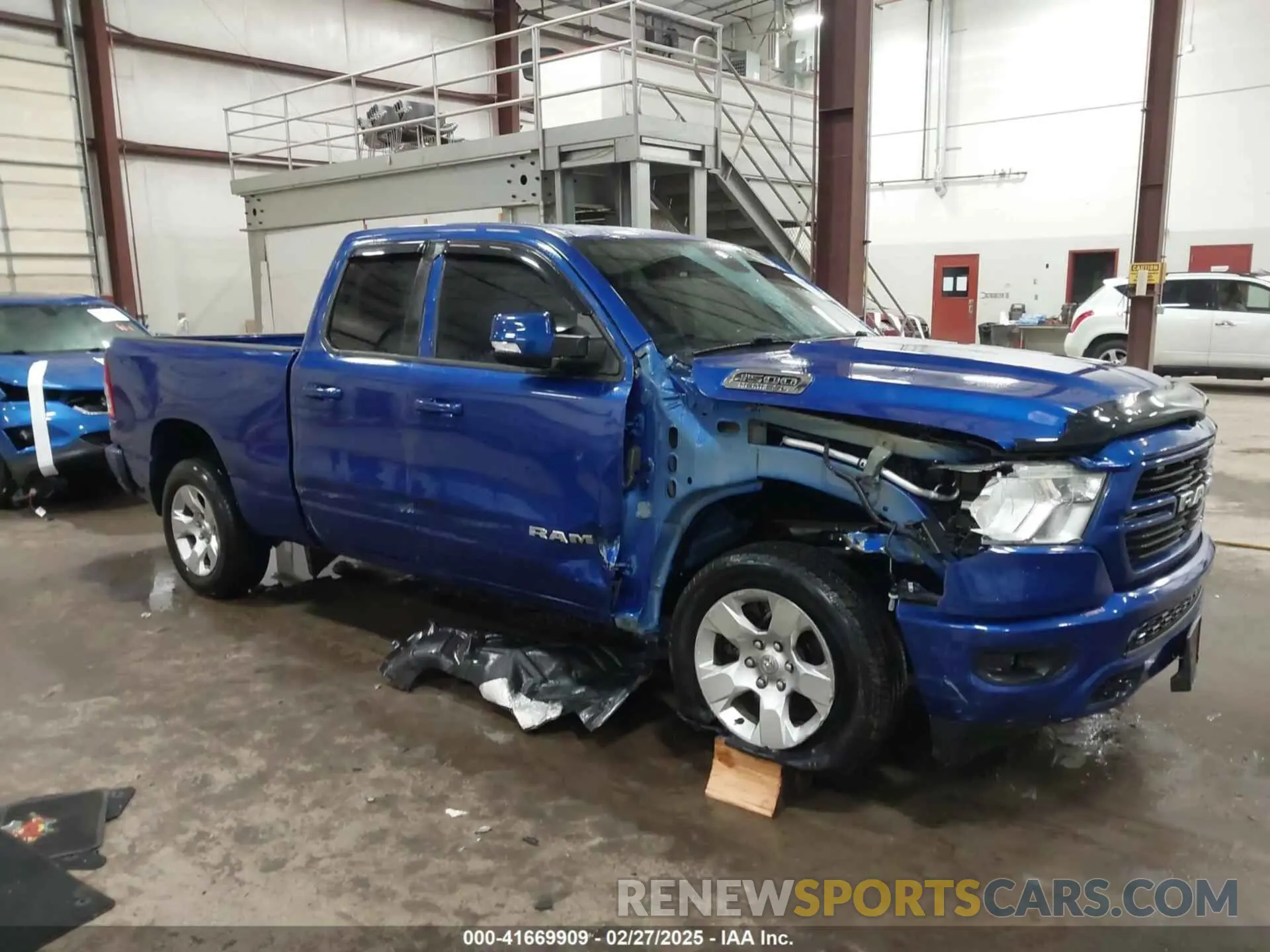 1 Photograph of a damaged car 1C6SRFBT0KN825865 RAM 1500 2019