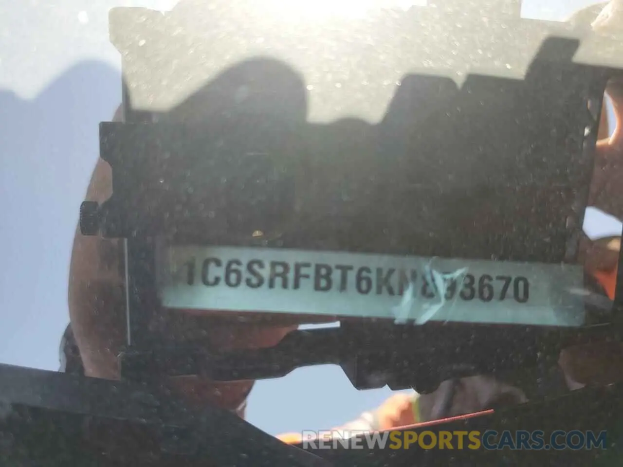12 Photograph of a damaged car 1C6SRFBT6KN893670 RAM 1500 2019