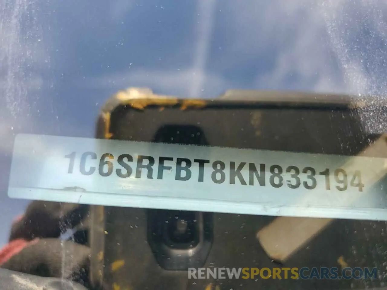 12 Photograph of a damaged car 1C6SRFBT8KN833194 RAM 1500 2019